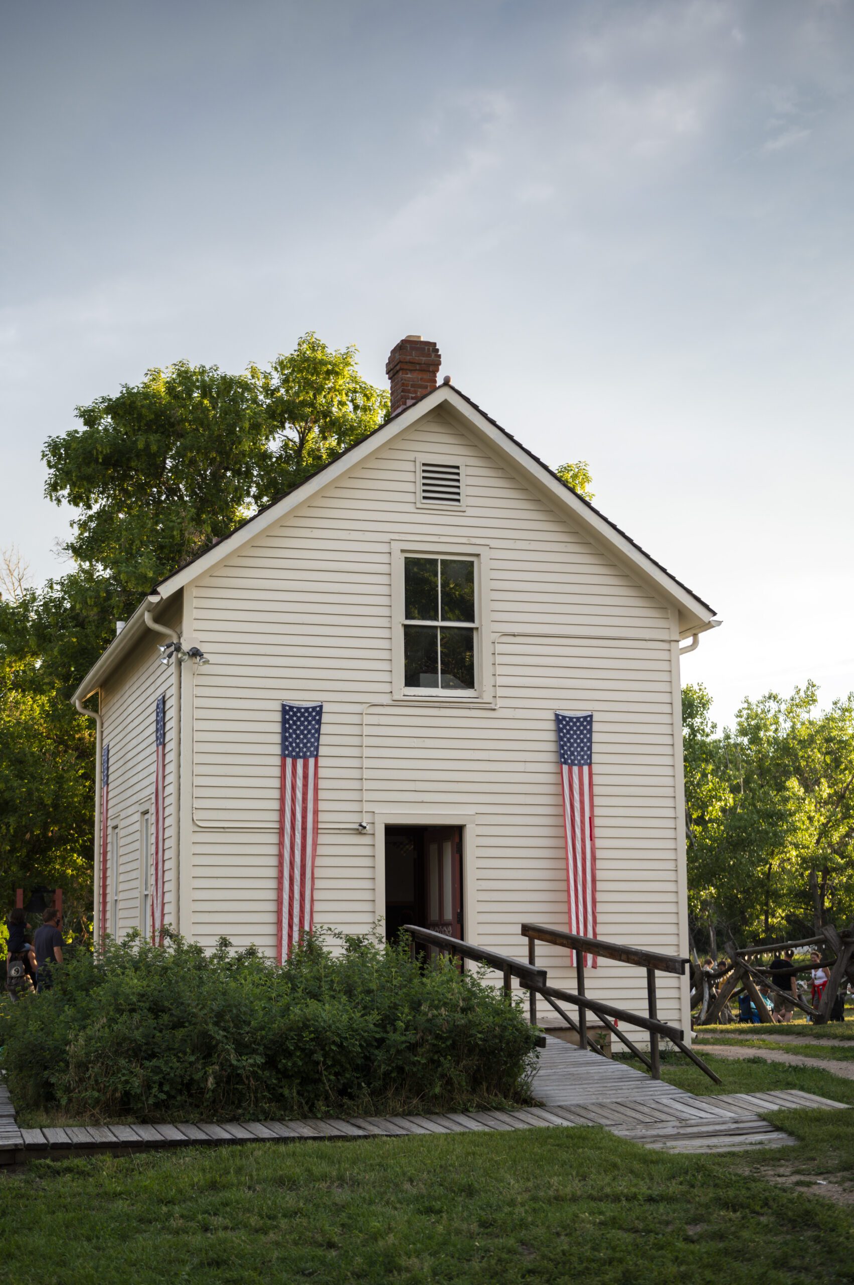 White house with ramp and American flag banners