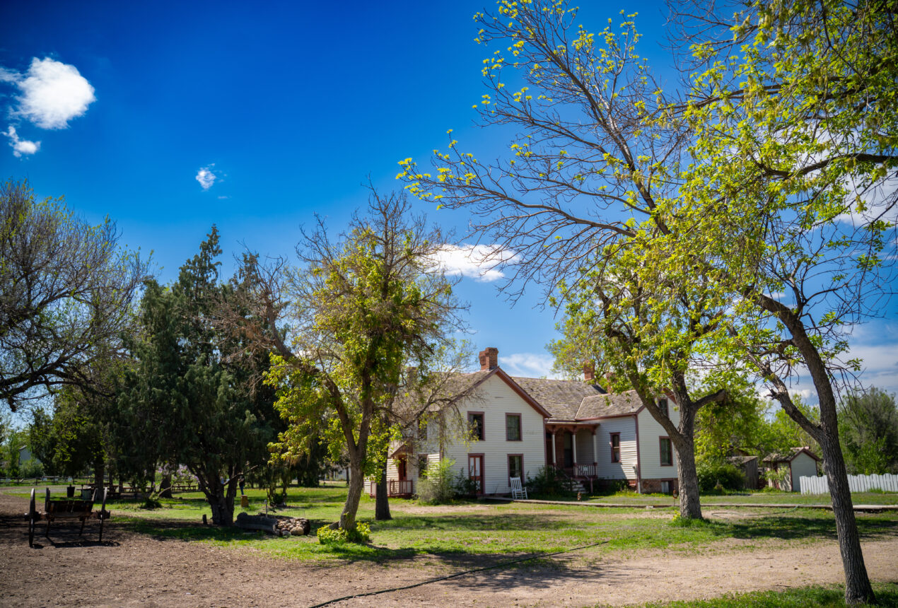 Historic house at Four Mile Park surrounded by trees